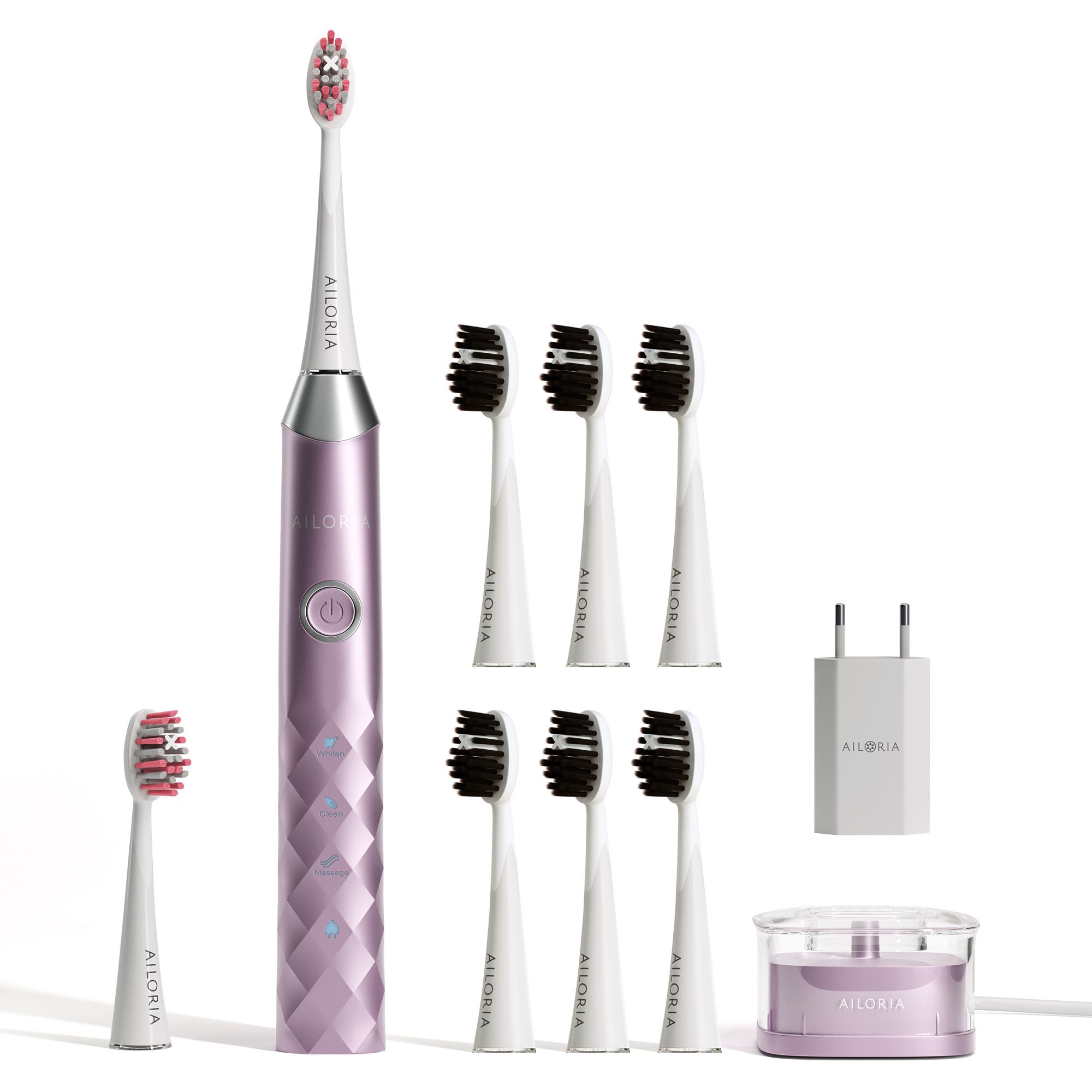 Brosse à dents électrique et accessoires. Comprend des têtes de brosse, un chargeur et un support. Logo AILORIA visible.