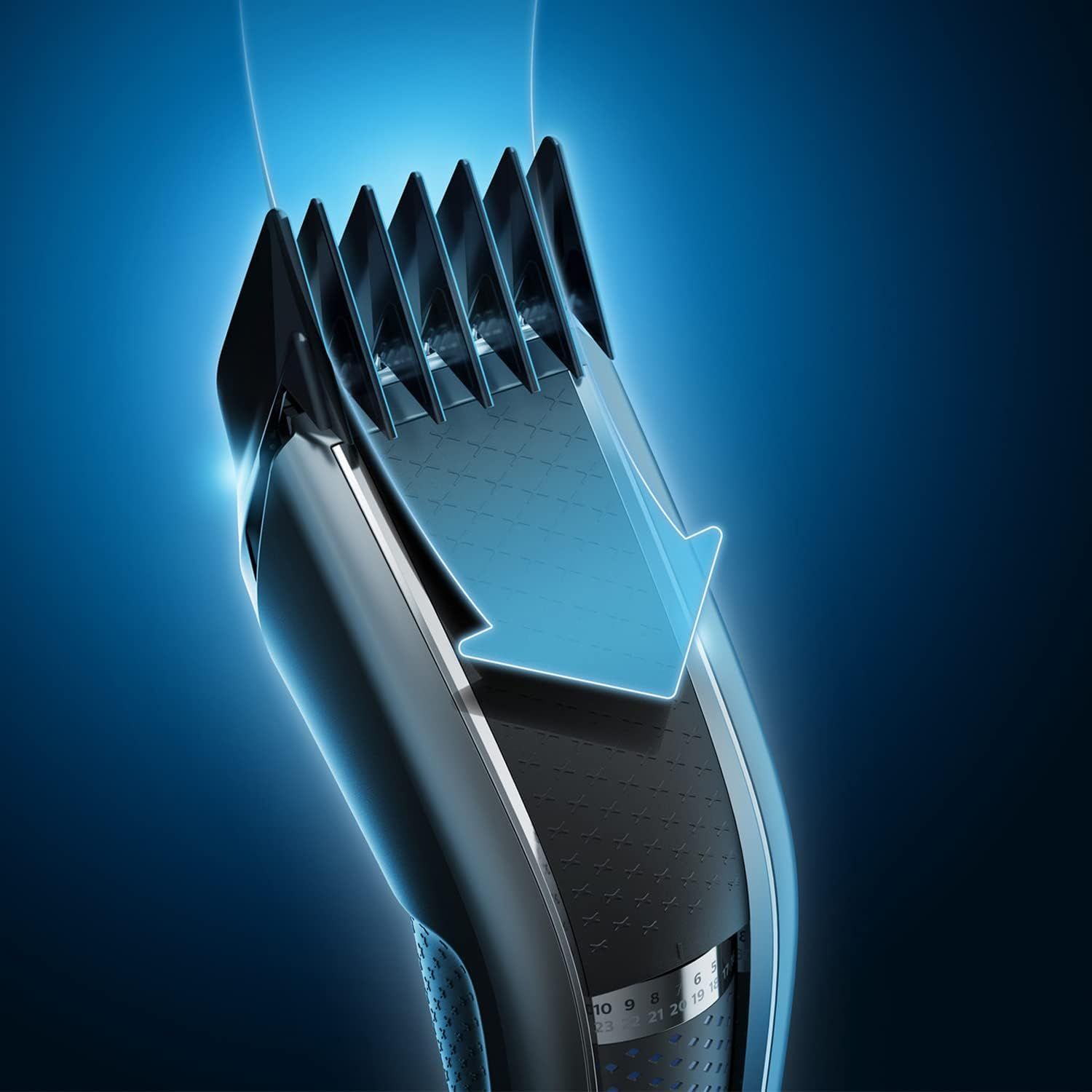 Gedetailleerde weergave van de Philips haartrimmer met messen en pijl.