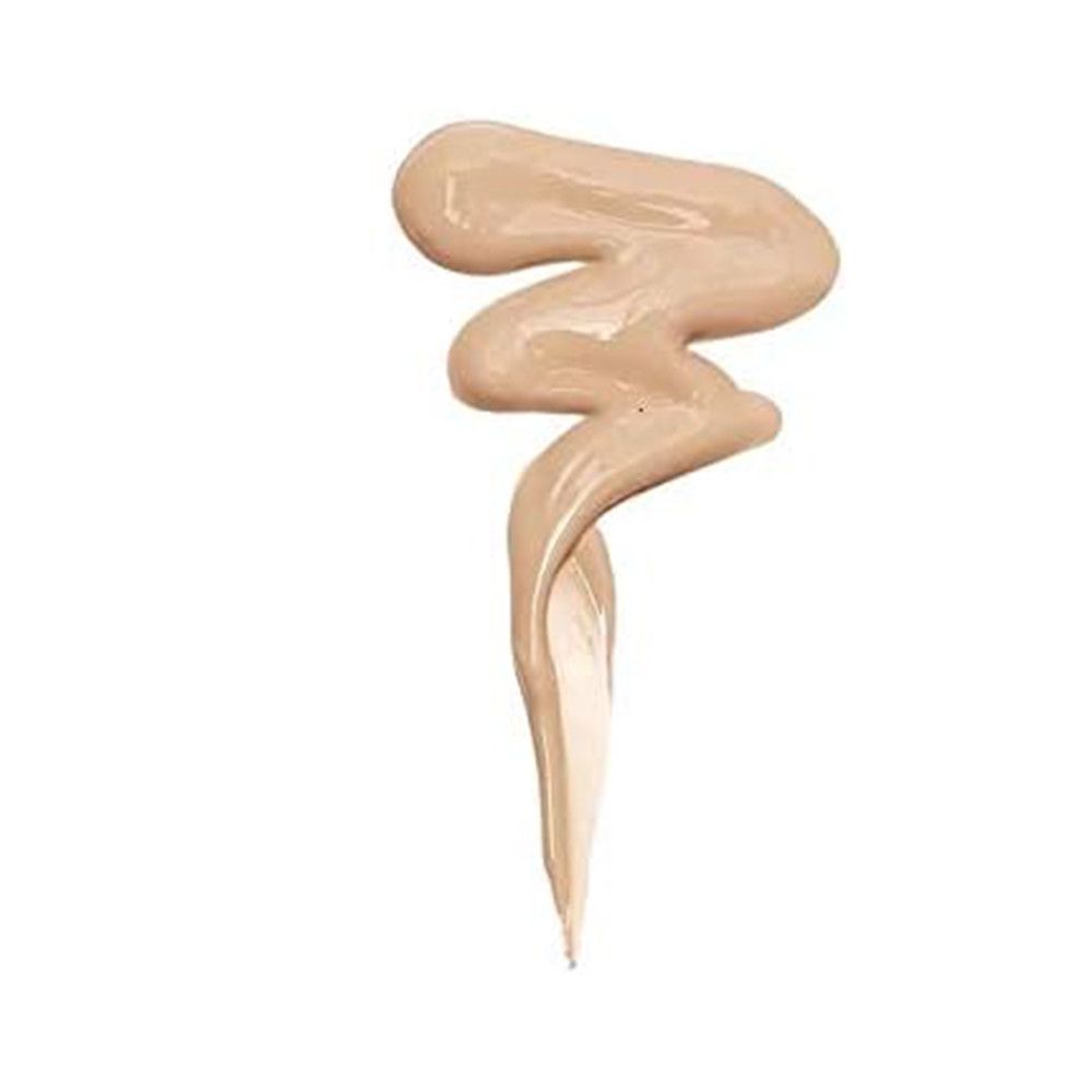 Échantillon de correcteur beige clair. Texture liquide, tracé ondulé. Teinte claire.