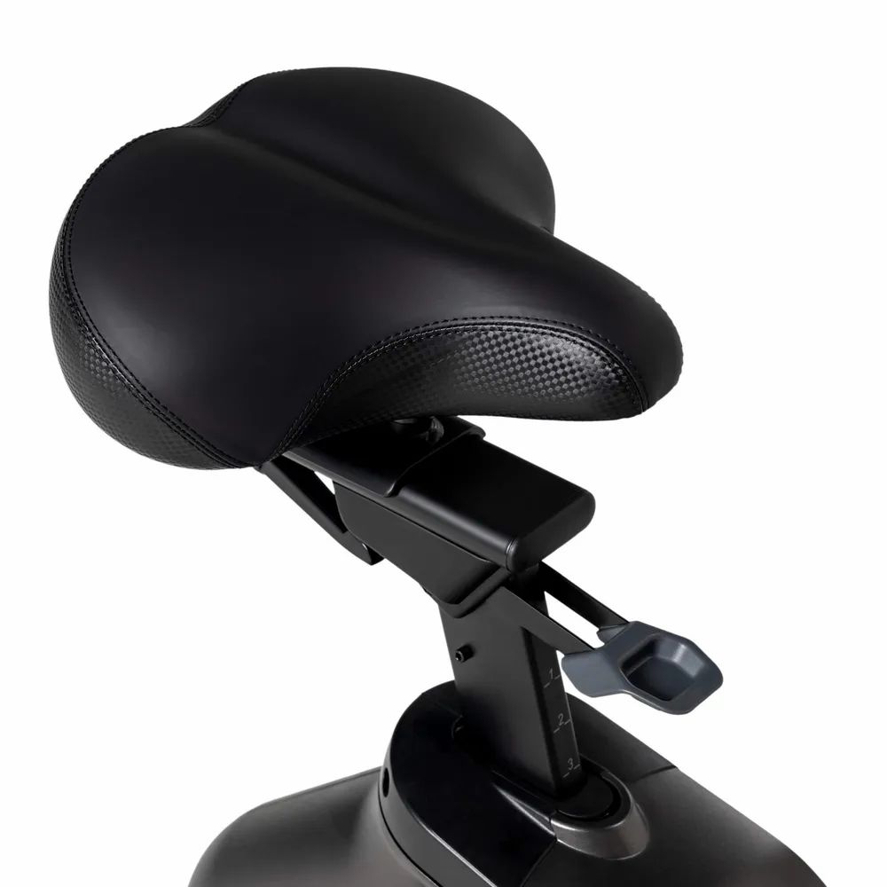 Selle de vélo d'appartement. Noir. Réglable. Rembourrée.