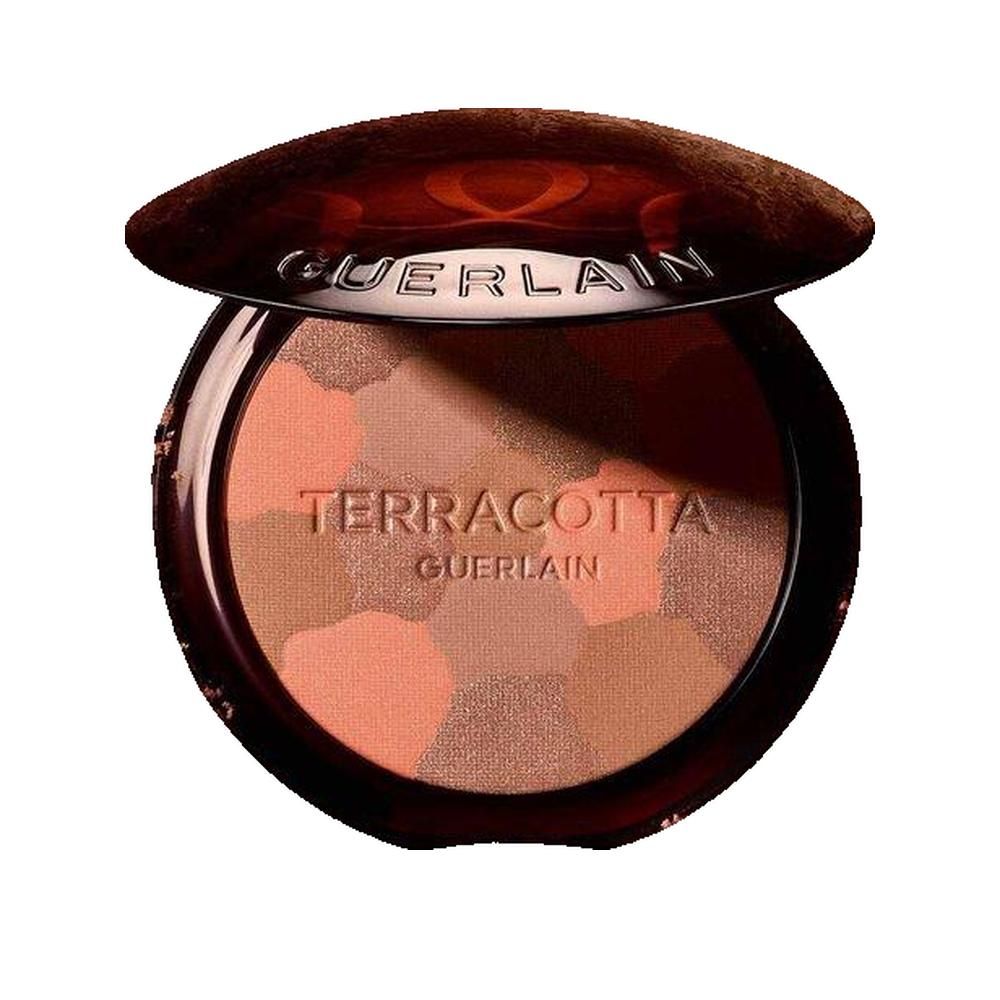 Poudre compacte ronde avec différentes teintes. Couvercle avec logo de la marque. Inscription : Terracotta Guerlain.