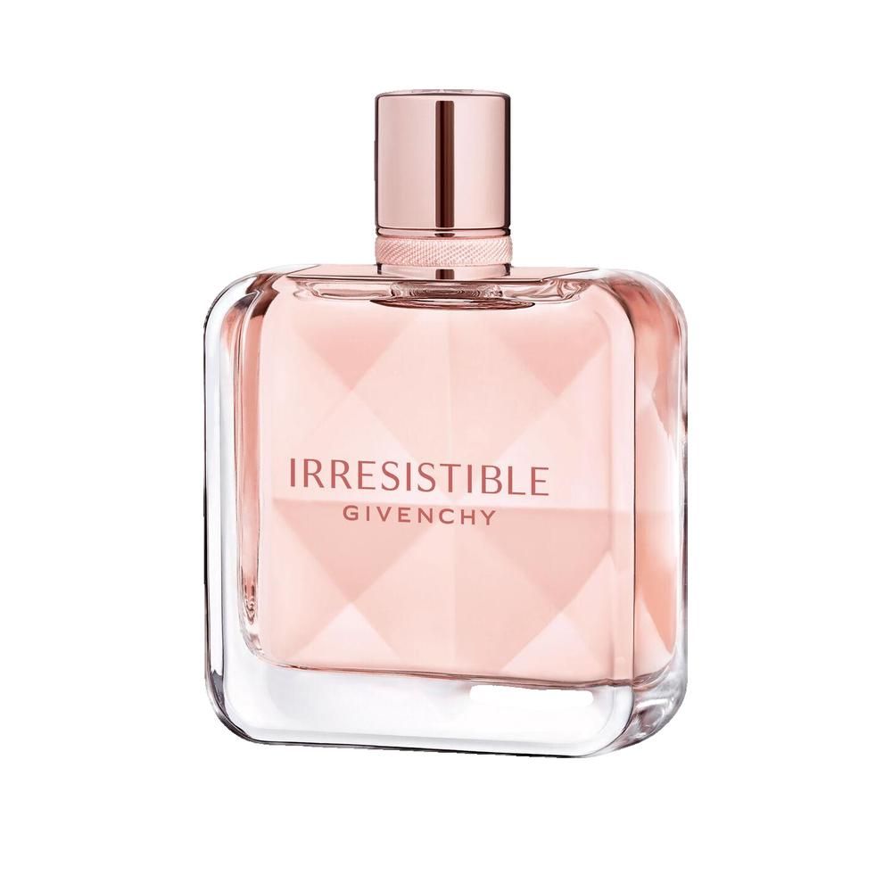 Flacon de parfum rose. Forme carrée avec design facetté. Inscription: Irresistible Givenchy.