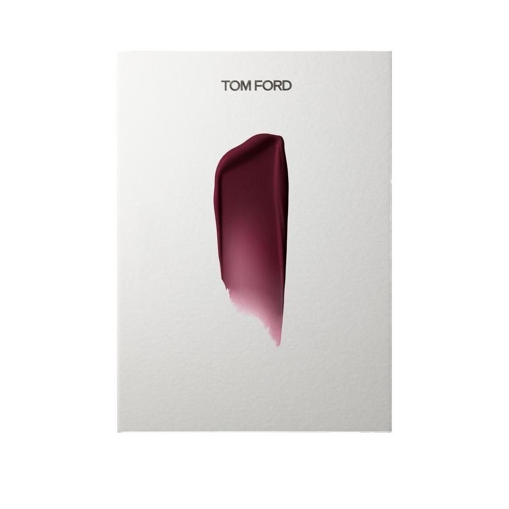Feuille blanche avec un échantillon de rouge à lèvres. Marque Tom Ford en haut.