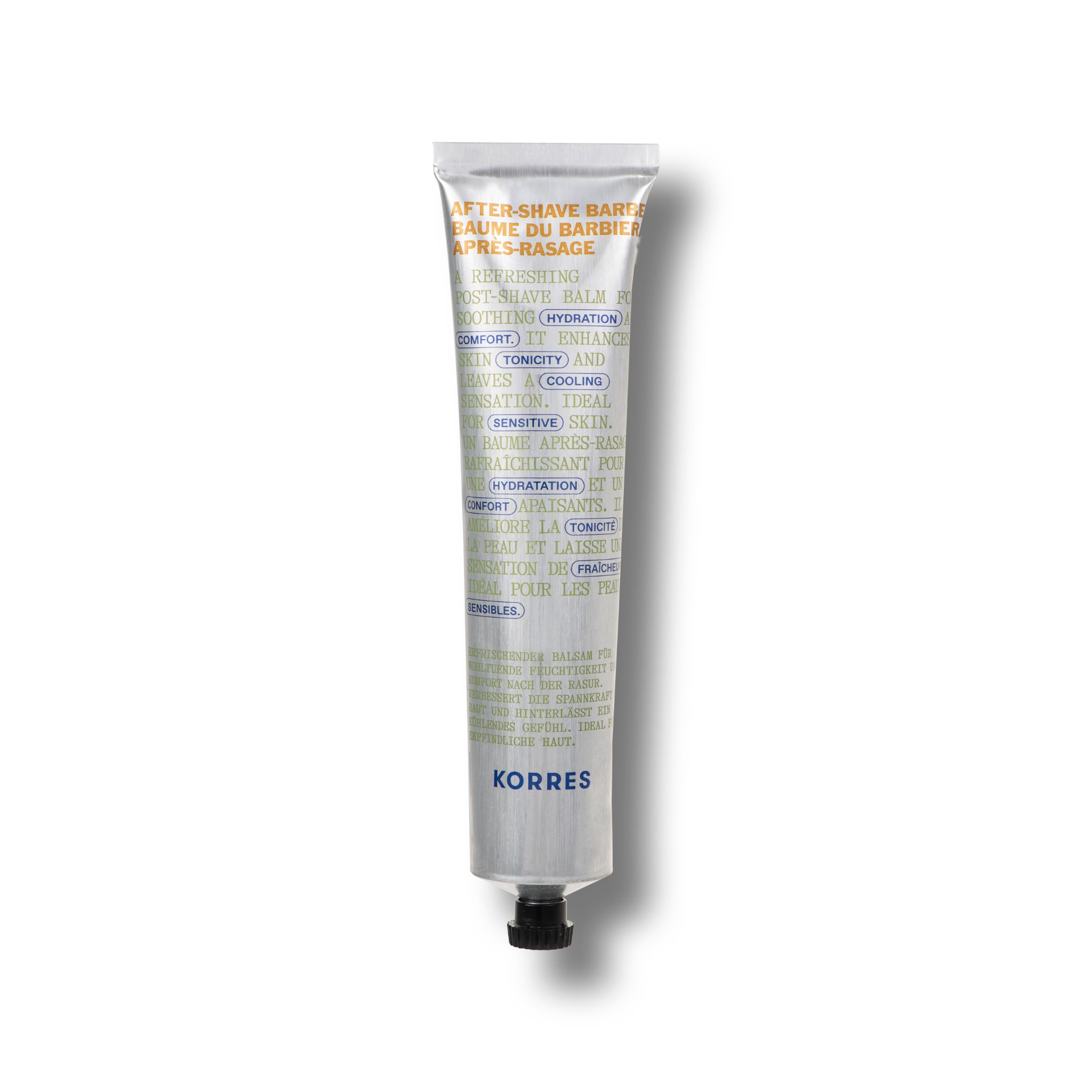 Zilveren tube met zwarte dop. Tekst: Aftershave Balm, KORRES. Groen-witte letters.