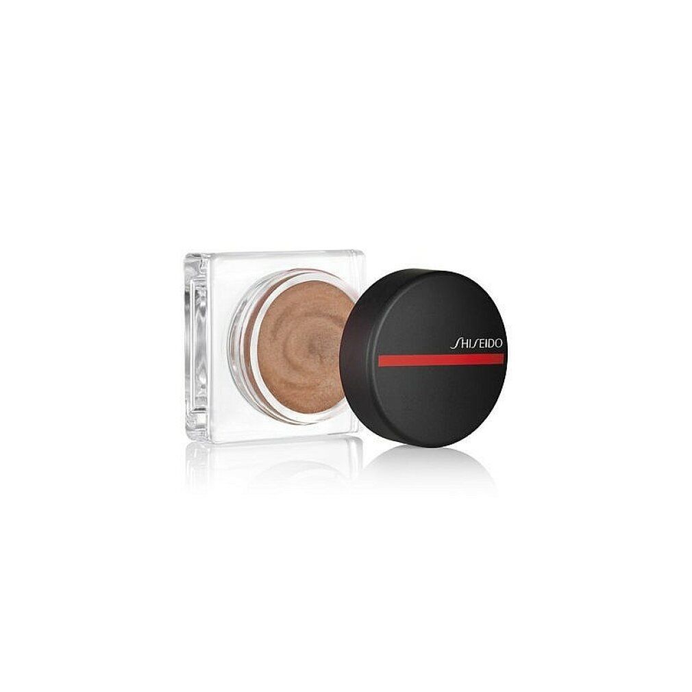 Blush in vierkante, transparante pot. Daarnaast een zwarte pot met rode streep en Shiseido-logo.