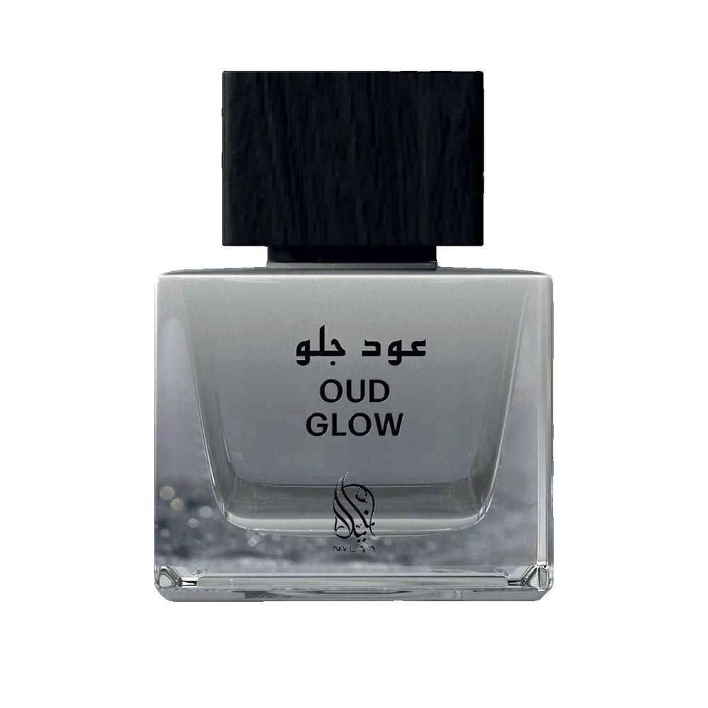 Vierkante fles met zwarte dop. Opschrift "OUD GLOW" in het Engels en Arabisch. Logo rechtsonder.