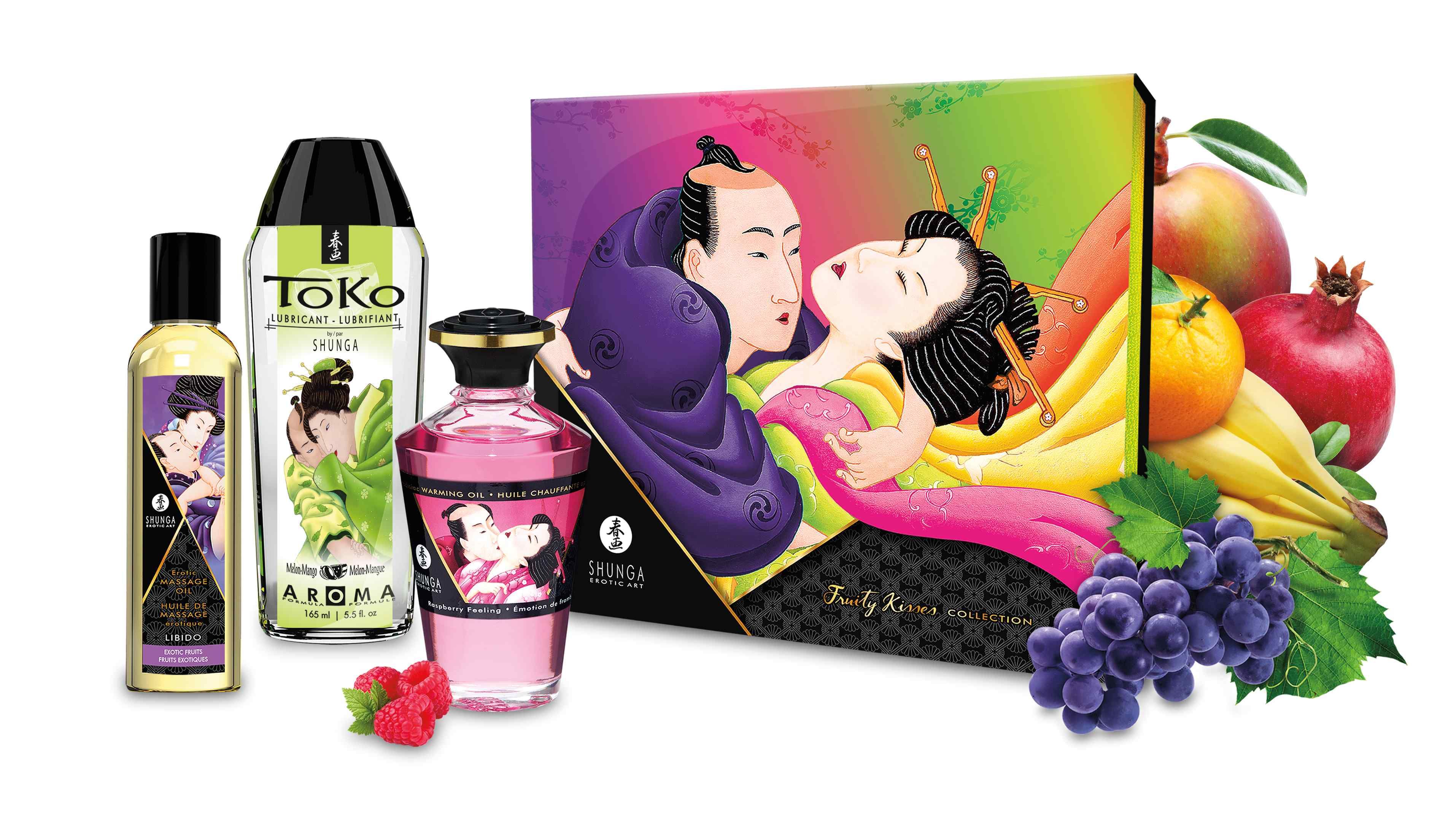 Coffret Shunga Fruity Kisses avec produits et fruits.