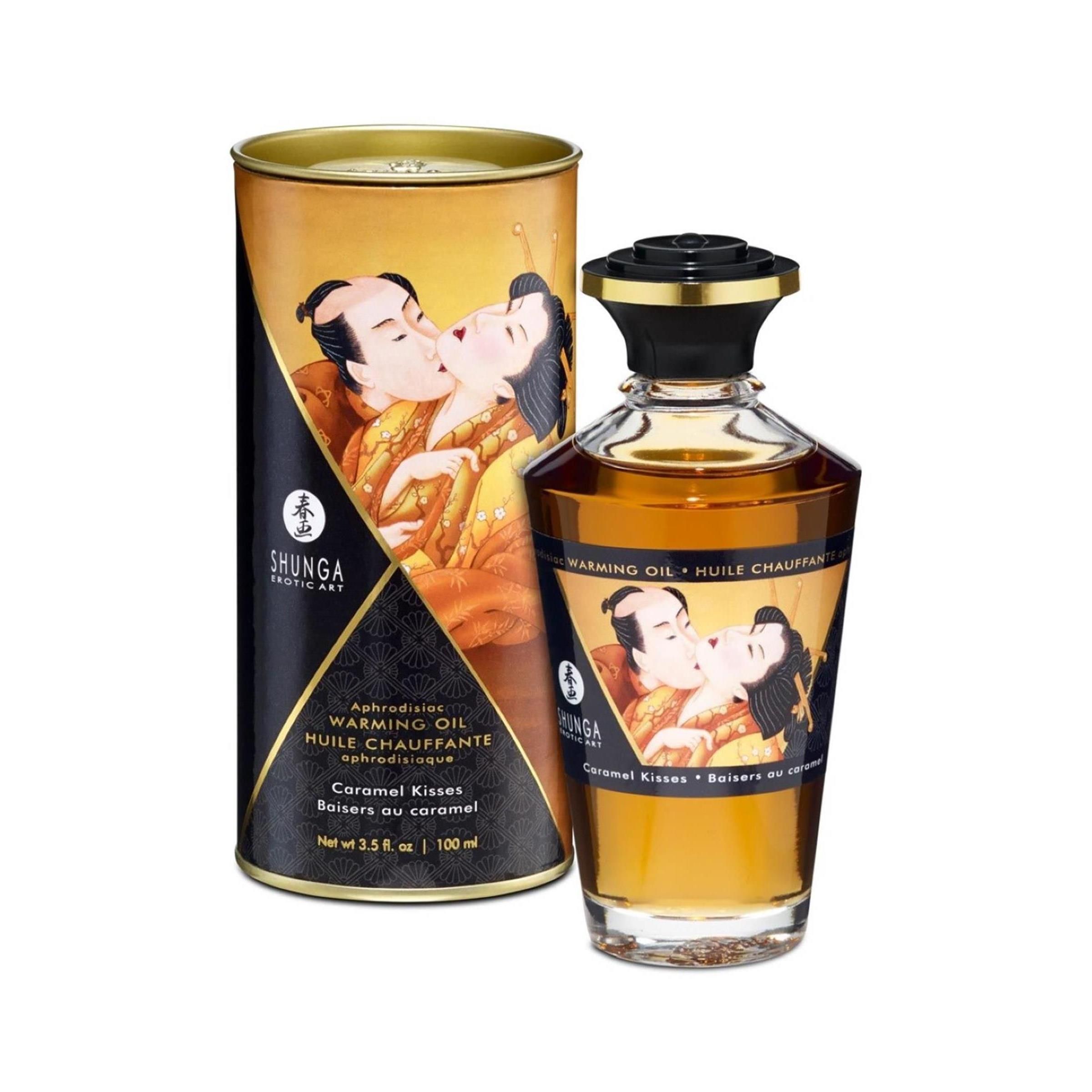 Cilindrische doos en oliefles. Doos met afbeelding van een kussend paar. Fles met zwarte dop en etiket.