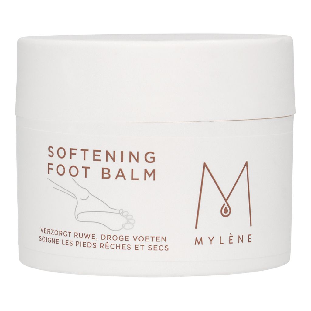 Pot blanc avec texte "SOFTENING FOOT BALM" et logo. Texte en dessous : "VERZORGT RUWE, DROGE VOETEN, SOIGNE LES PIEDS RÊCHES ET SECS".