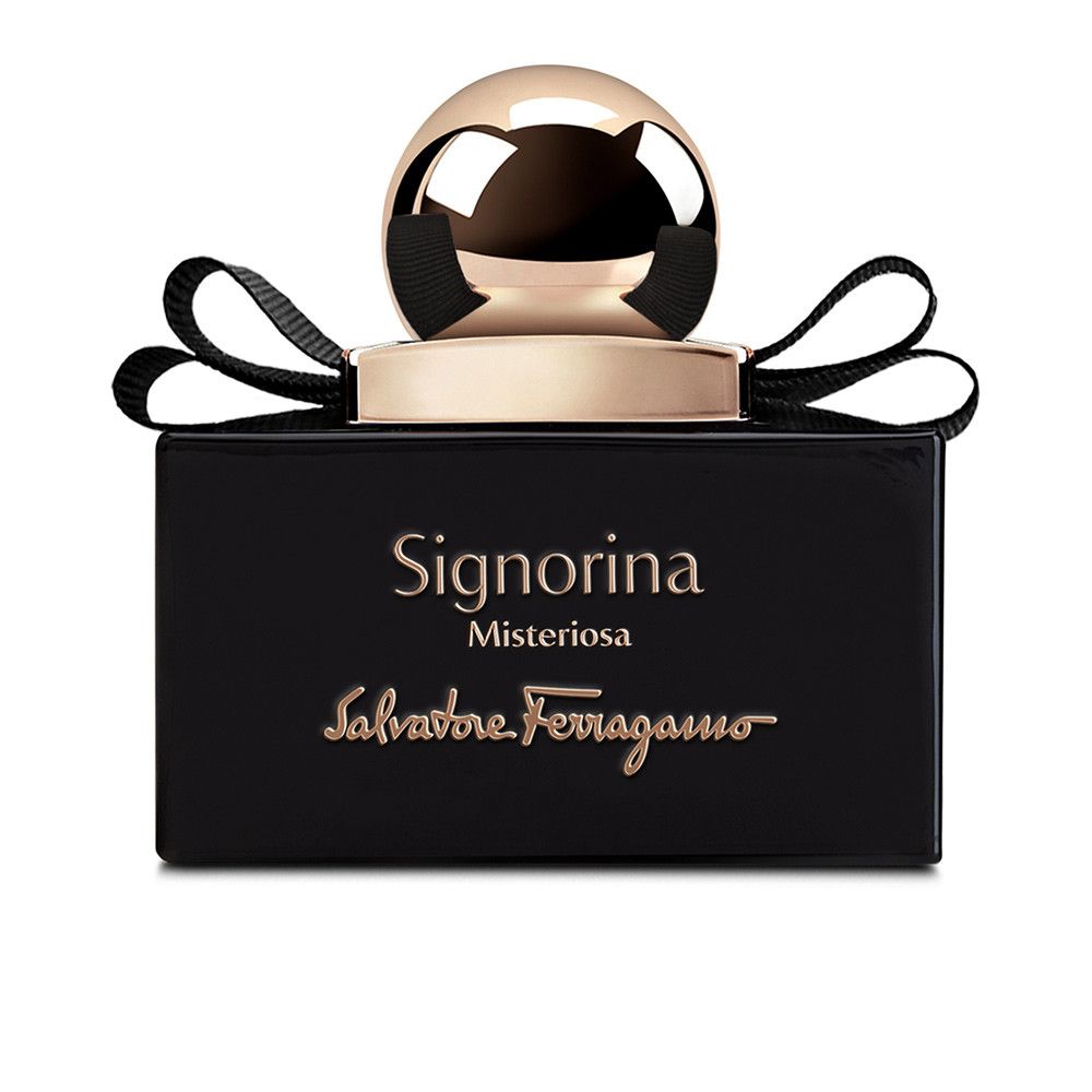 Zwarte fles met gouden dop en strik. Opschrift Signorina Misteriosa en Salvatore Ferragamo.