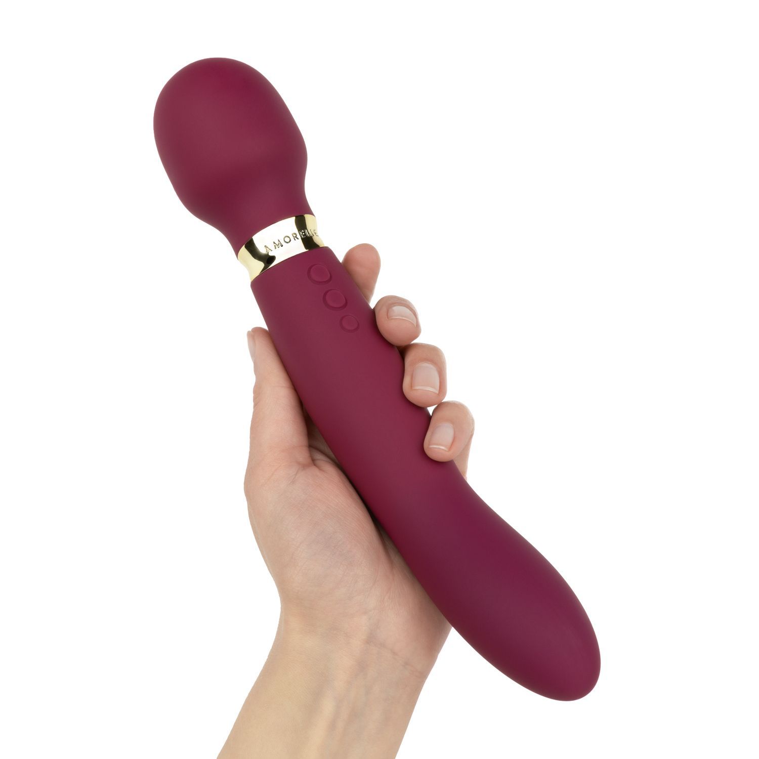 Paarse vibrator in hand. Afgeronde kop, gouden details en knoppen.