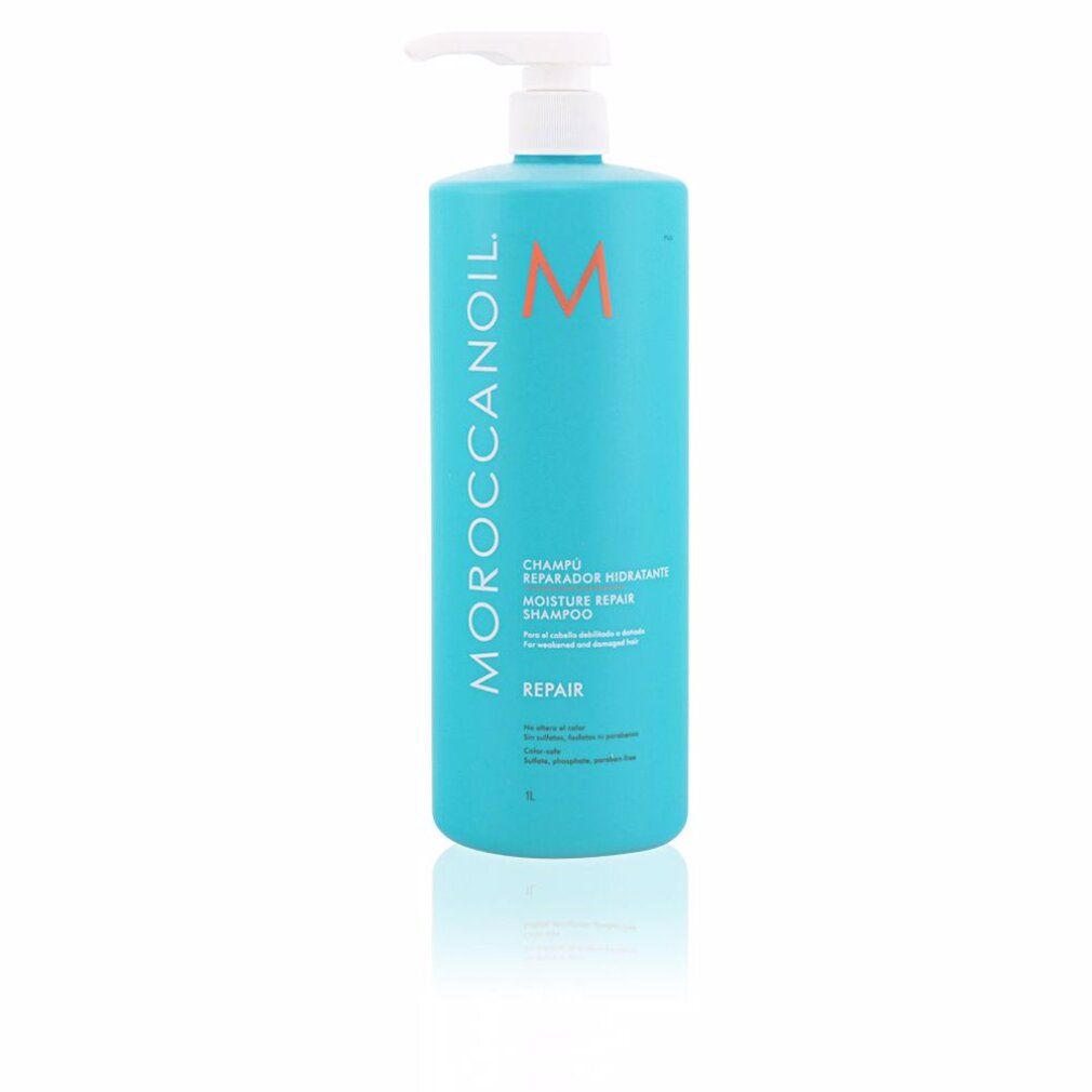 Turquoise shampoo fles met witte pomp. Opschrift: Moroccanoil, Moisture Repair Shampoo, Repair. Oranje logo.