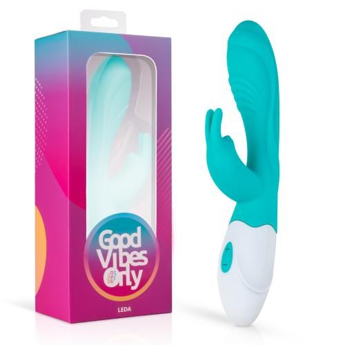 Turquoise-wit wellnessproduct in verpakking. Opschrift: Good Vibes Only, Leda.