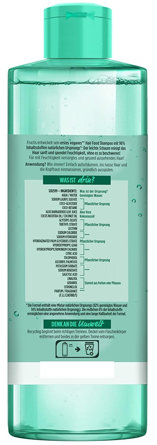 Dos du flacon de shampooing Garnier Fructis. Texte avec ingrédients et informations d'utilisation. Vegan.