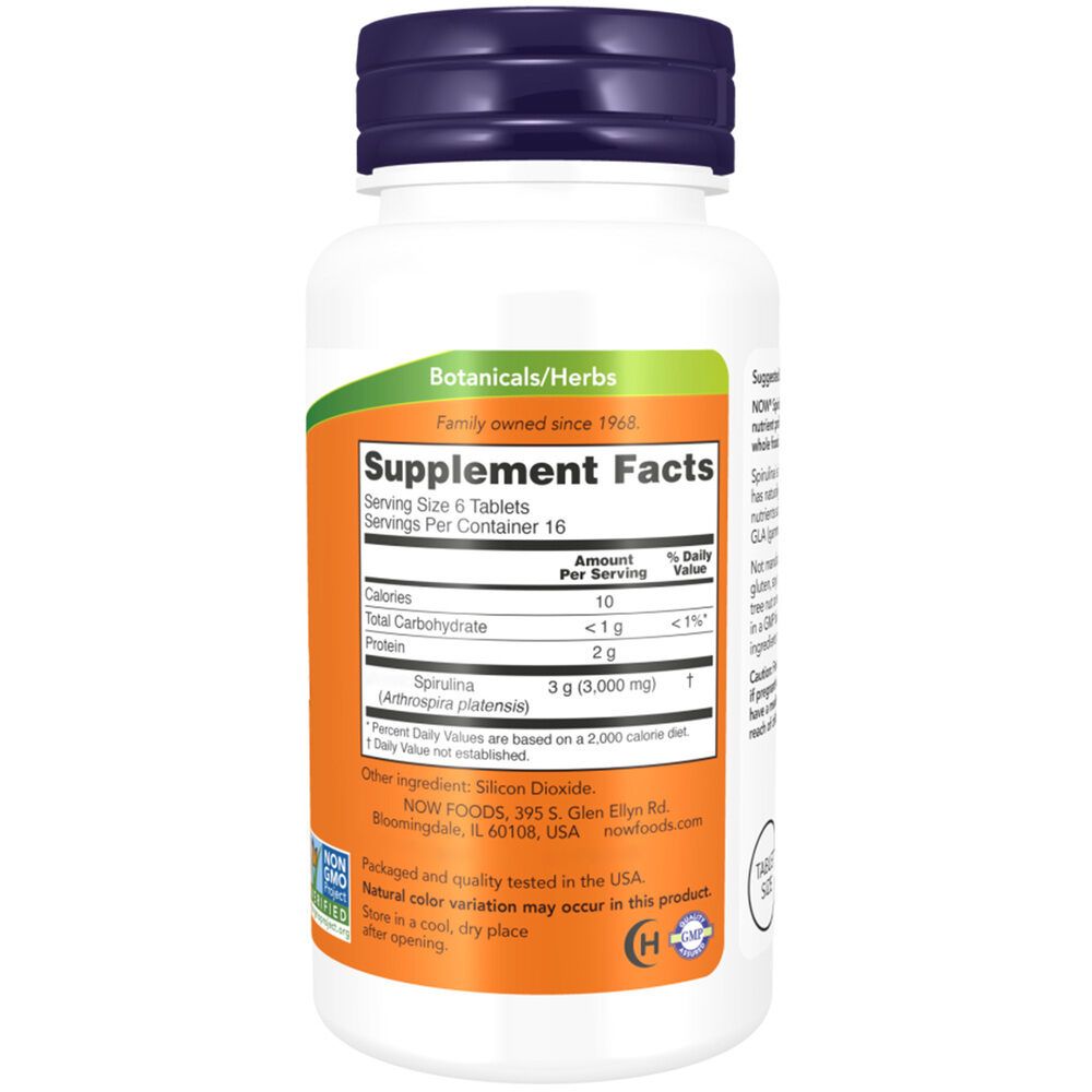 Dos du flacon. Inscription: Supplement Facts, Spirulina, 3 g. Fond orange, texte blanc.