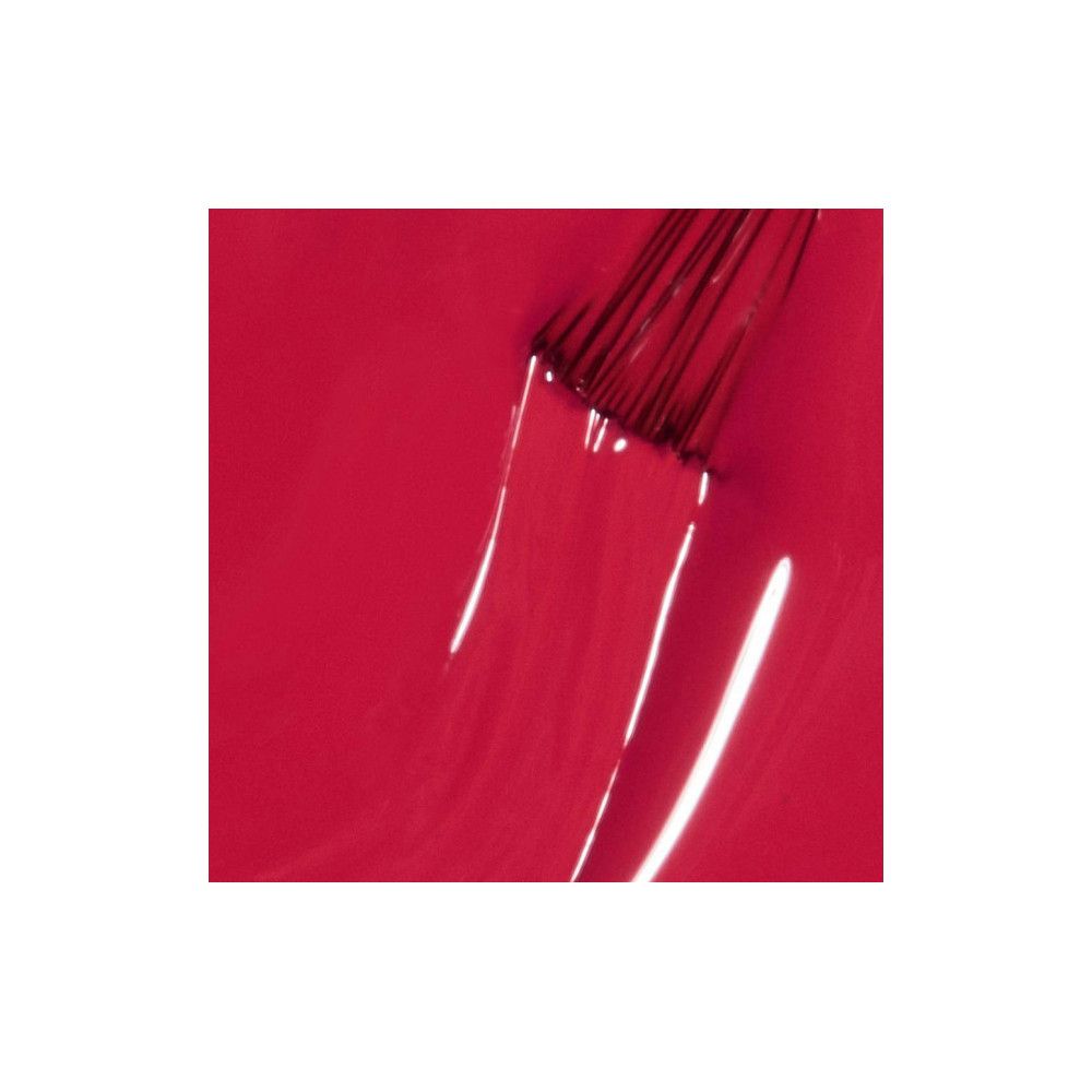 Nagellak applicator met rode kleur. Close-up, toont de textuur en tint.