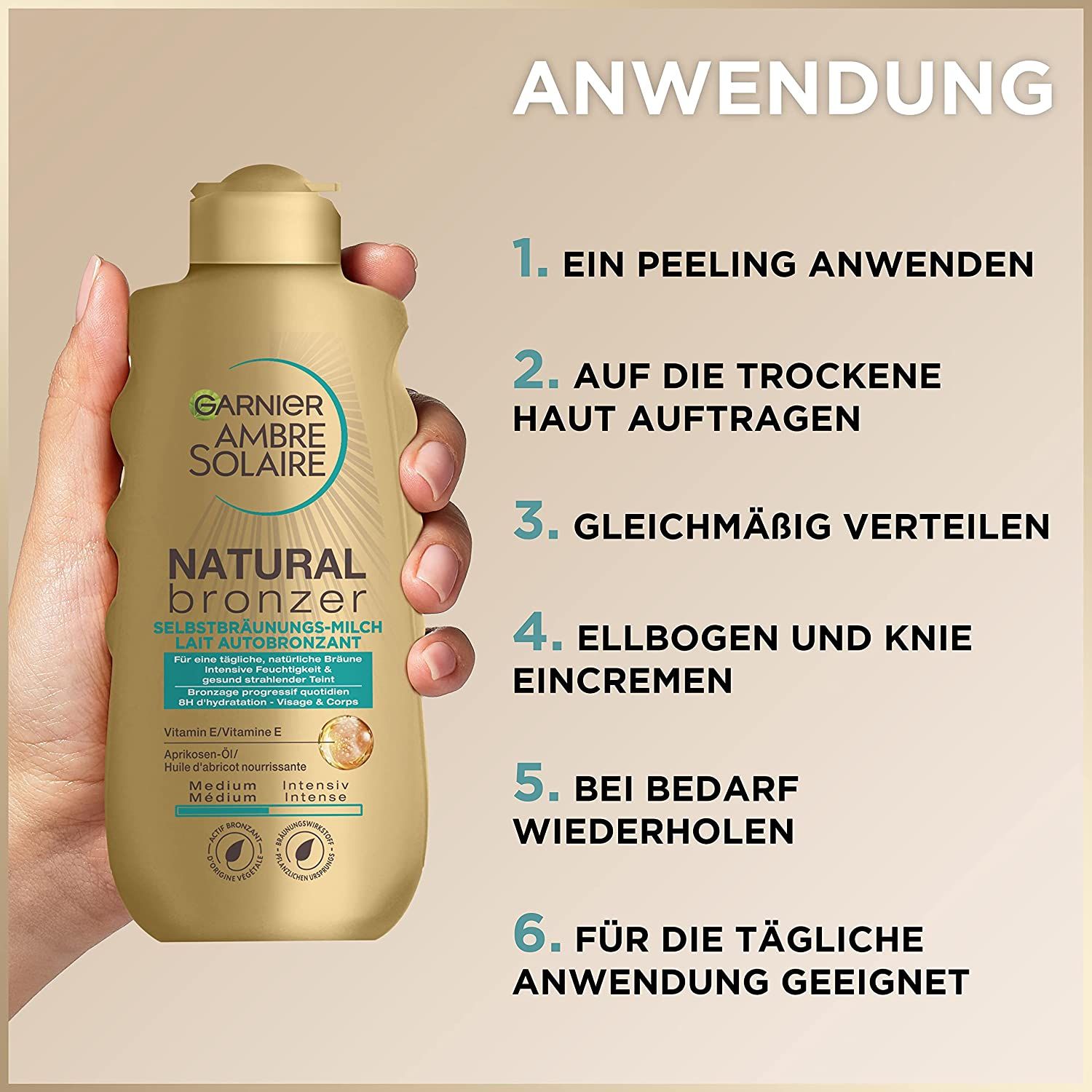 Main tenant flacon Garnier Ambre Solaire Natural Bronzer. Application: gommage, appliquer sur peau sèche, étaler, coudes et genoux.
