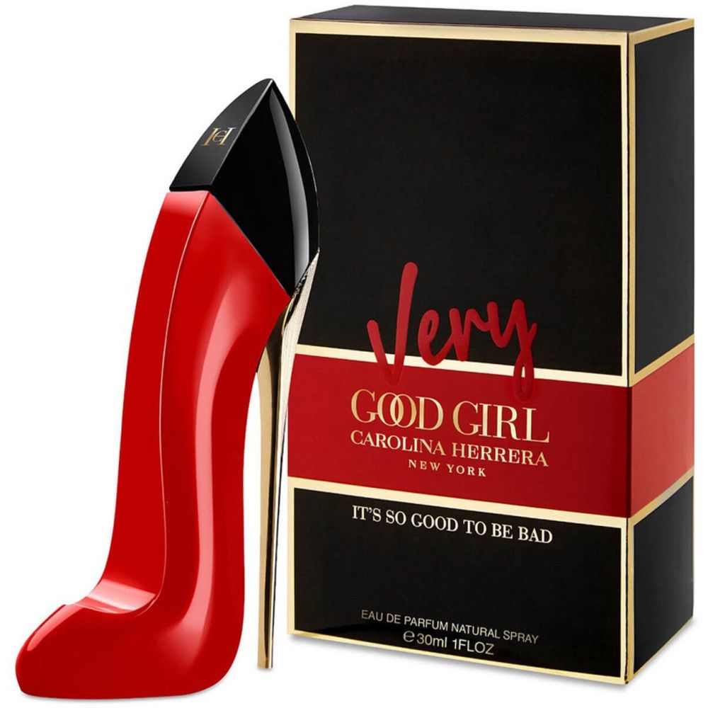 Rode damesgeur in pumps-vorm met zwarte sluiting. Zwarte verpakking met rode tekst. Tekst: Very Good Girl. Carolina Herrera.