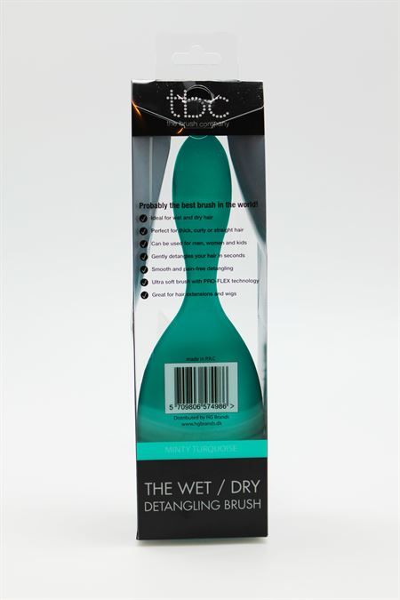 Arrière de la brosse TBC Wet & Dry menthe turquoise dans son emballage.