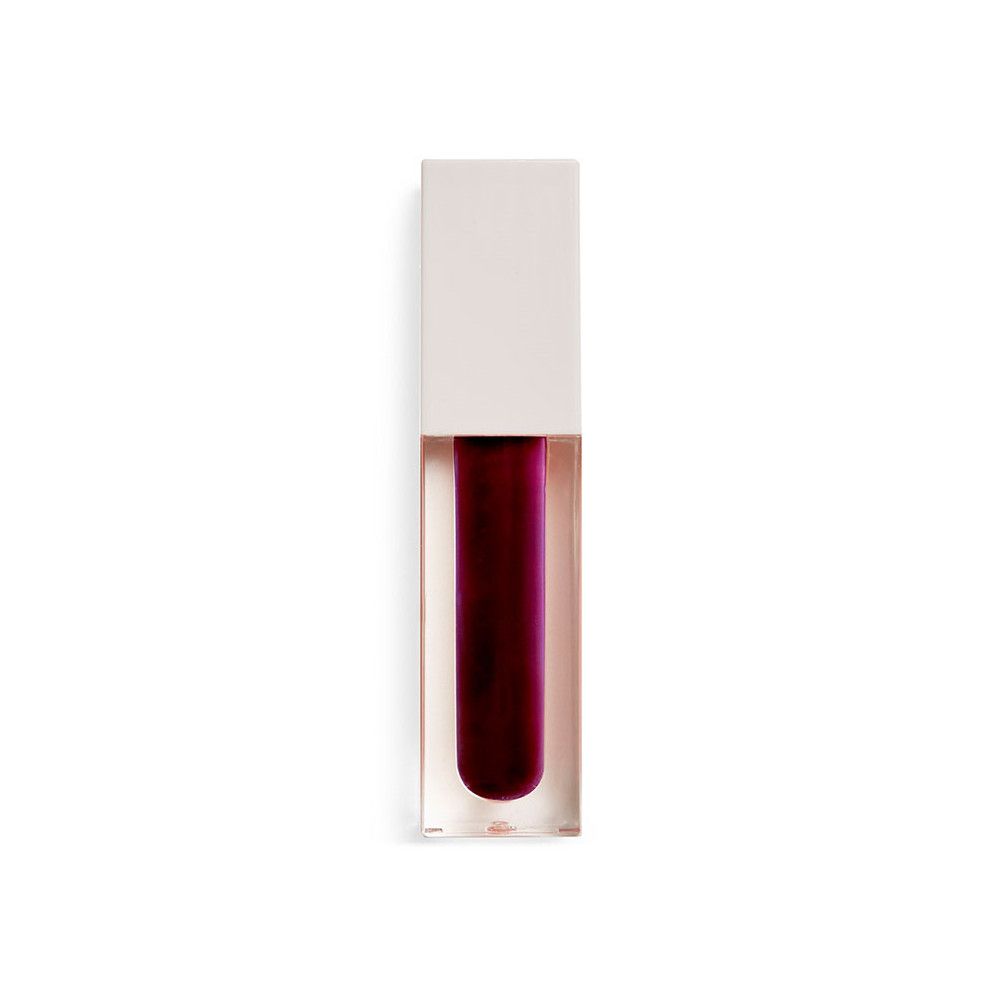 Flacon de gloss avec bouchon fermé. Le gloss est rouge foncé et dans un contenant transparent.