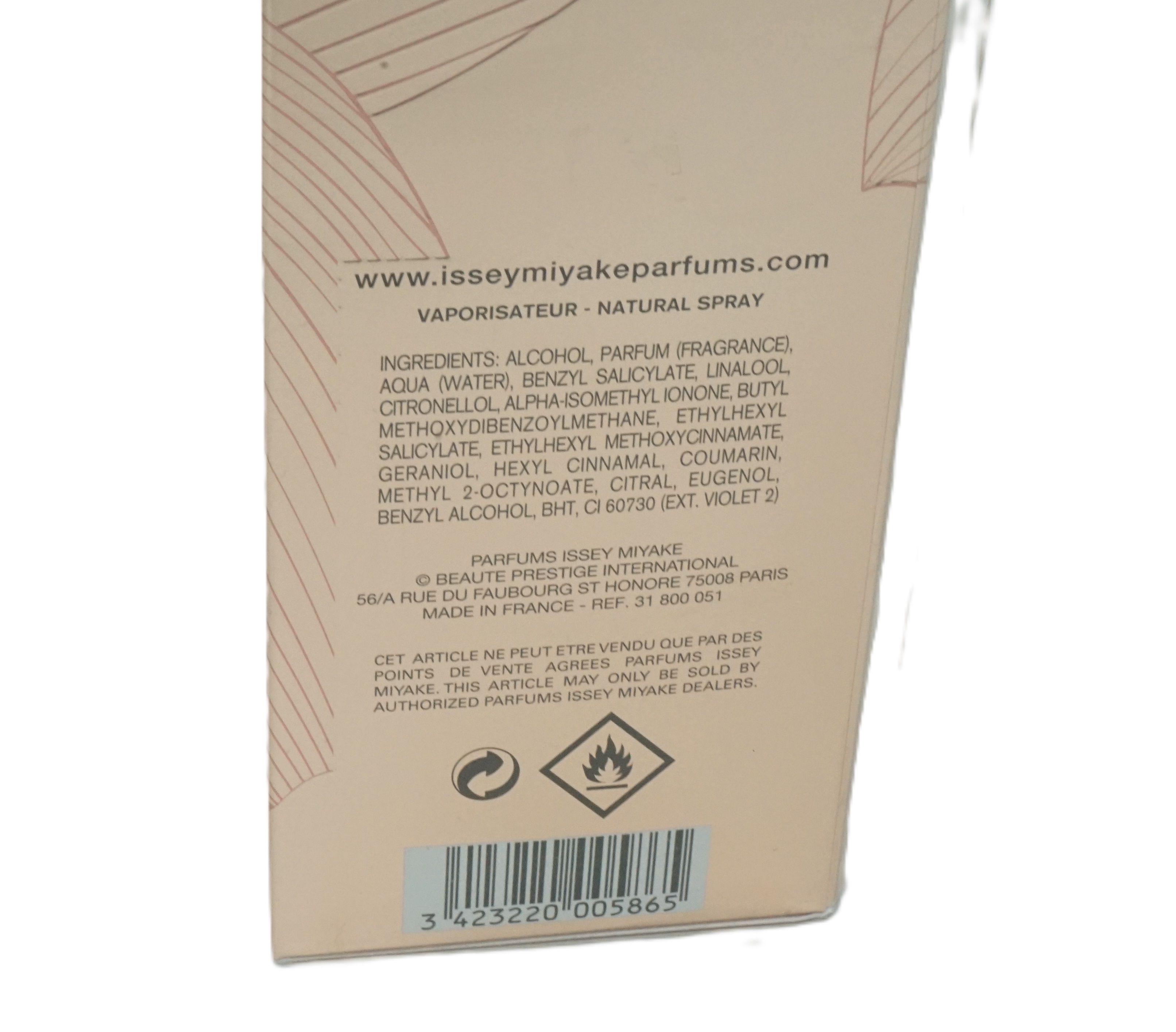 Parfumdoos. Tekst: Issey Miyake, Nectar D'Issey, Première Fleur. Gouden design met bloemmotief. 90ml, 3 fl.oz.