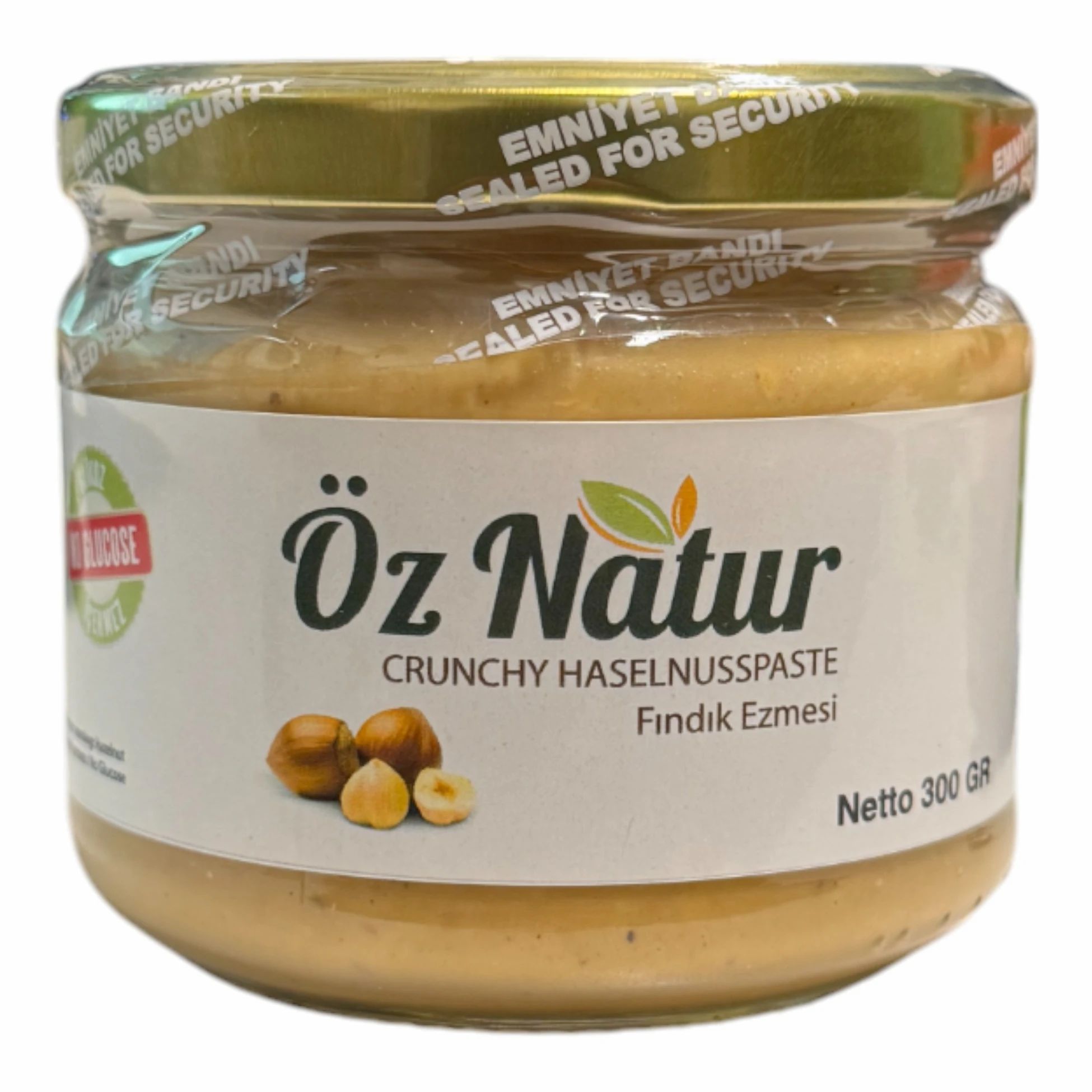 Pot de beurre de noisettes. Inscription : Öz Natur, Crunchy Haselnusspaste, Fındık Ezmesi. Sceau : Emniyet Bandi.