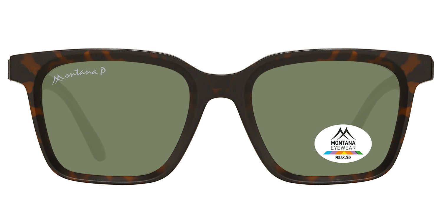 Lunettes de soleil avec monture marron et verres verts. Un autocollant avec le logo Montana Eyewear est visible sur un verre.