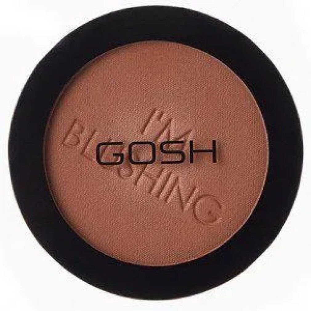 Boîtier cosmétique rond noir avec fard à joues brun. "GOSH I'M BLUSHING" est inscrit sur le fard.