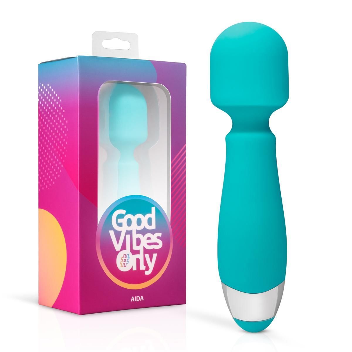Turquoise massage vibrator met zilveren uiteinde en verpakking. Op de verpakking staat "Good Vibes Only" en "Aida".