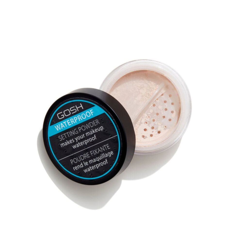 Boîte ouverte avec couvercle noir. Inscription GOSH WATERPROOF SETTING POWDER. Poudre avec trous. Couvercle à côté.