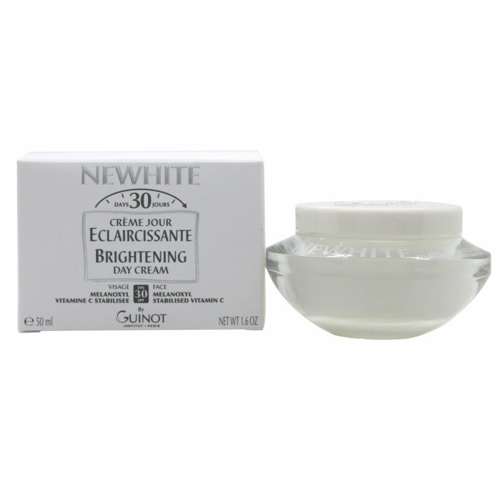 Crèmepot en doos. Op de doos staat "NEWWHITE", "SPF 30" en "GUINOT". De pot staat ernaast.