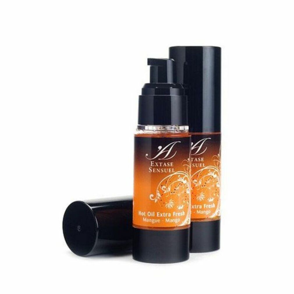 Twee flessen Extase Sensuel Hot Oil Extra Fresh Mango met pompdispensers en een dop.