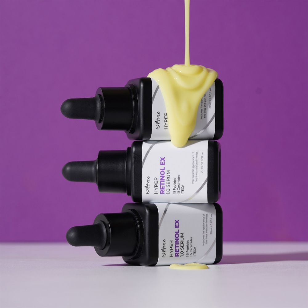 Drie ISNTREE Hyper Retinol EX 1.0 Serum flesjes gestapeld.