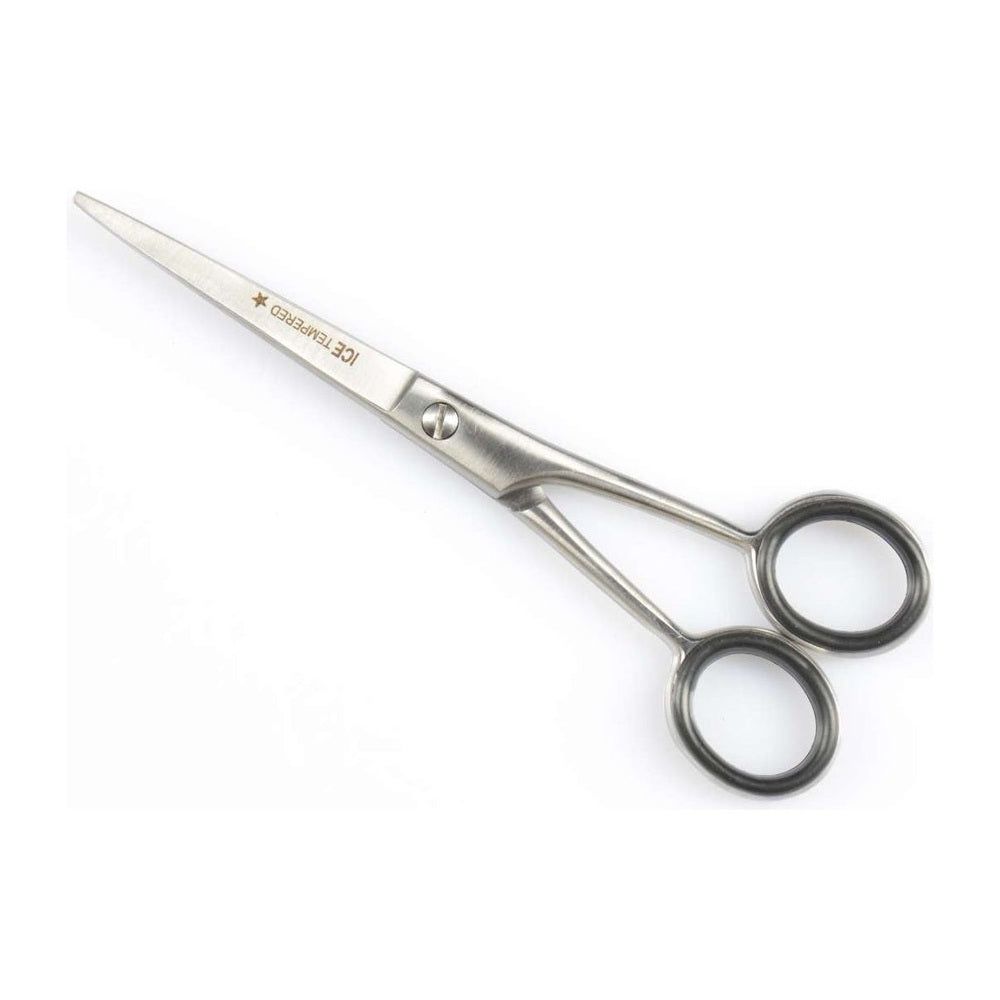 Ciseaux à cheveux en métal. Avec deux poignées rondes et une lame avec l'inscription "ICE TEMPERED".