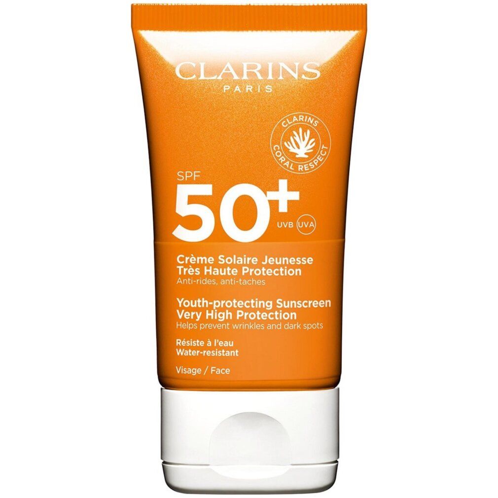 Clarins zonnecrème SPF 50+ gezicht. Oranje tube, witte dop, koraal logo.