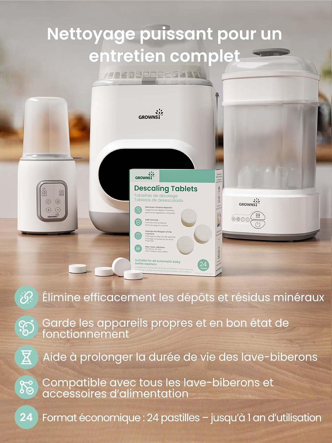 Boîte de pastilles détartrantes à côté de deux appareils de nettoyage pour biberons.