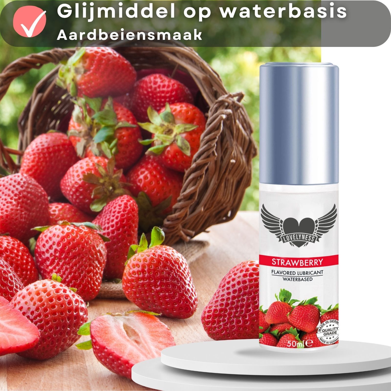 Glijmiddel fles met aardbeien en tekst. Tekst: Strawberry, Flavored Lubricant, Waterbased.