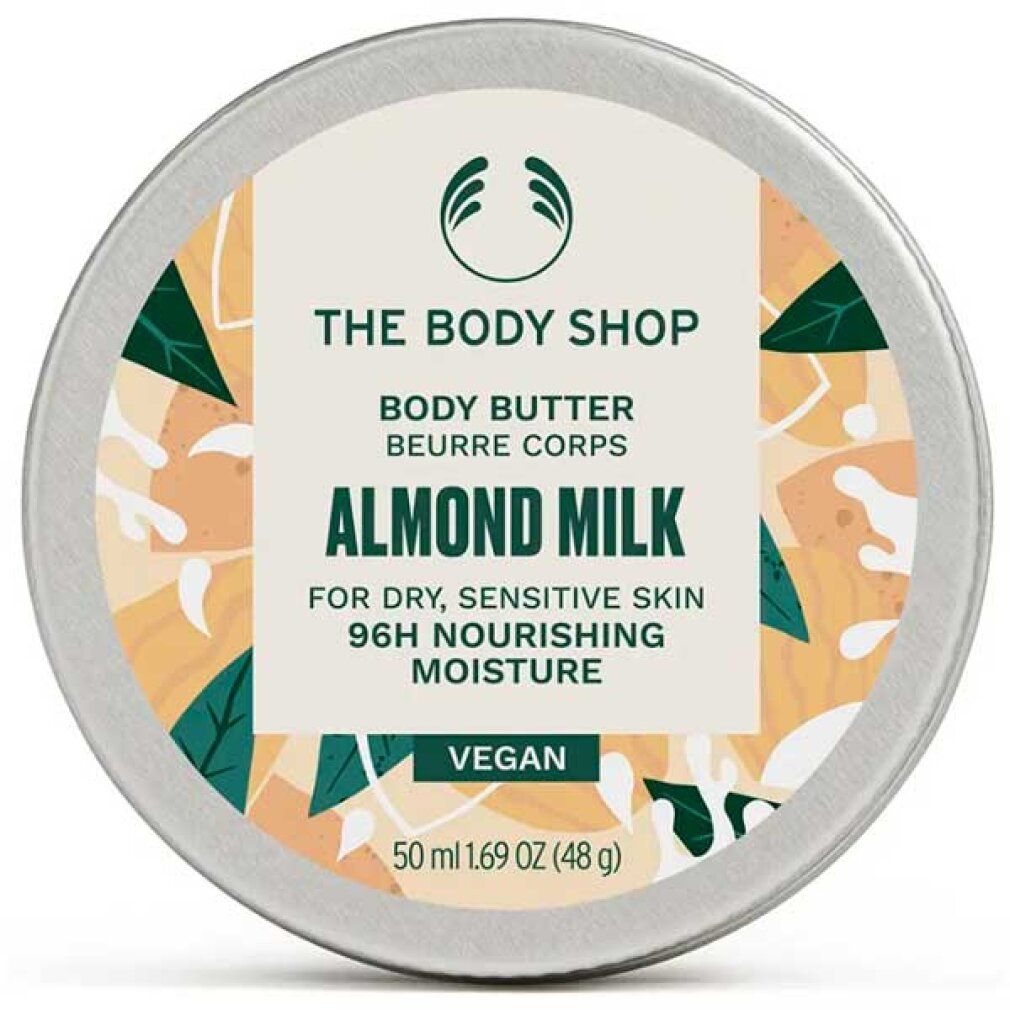 Pot rond de beurre corporel The Body Shop. Inscription : Almond Milk, pour peaux sèches et sensibles. Vegan. 50 ml.