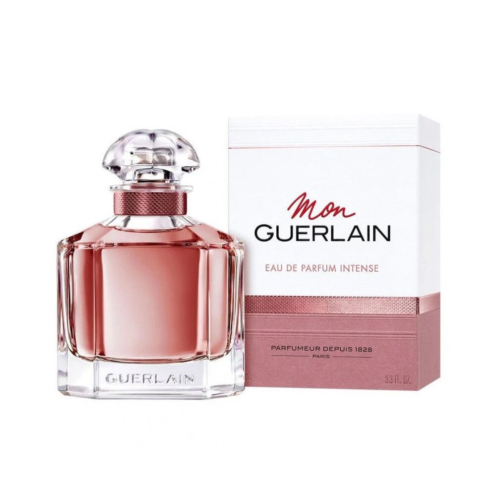 Roze parfumfles naast witte verpakking. Opschrift Mon Guerlain en Eau de Parfum Intense.