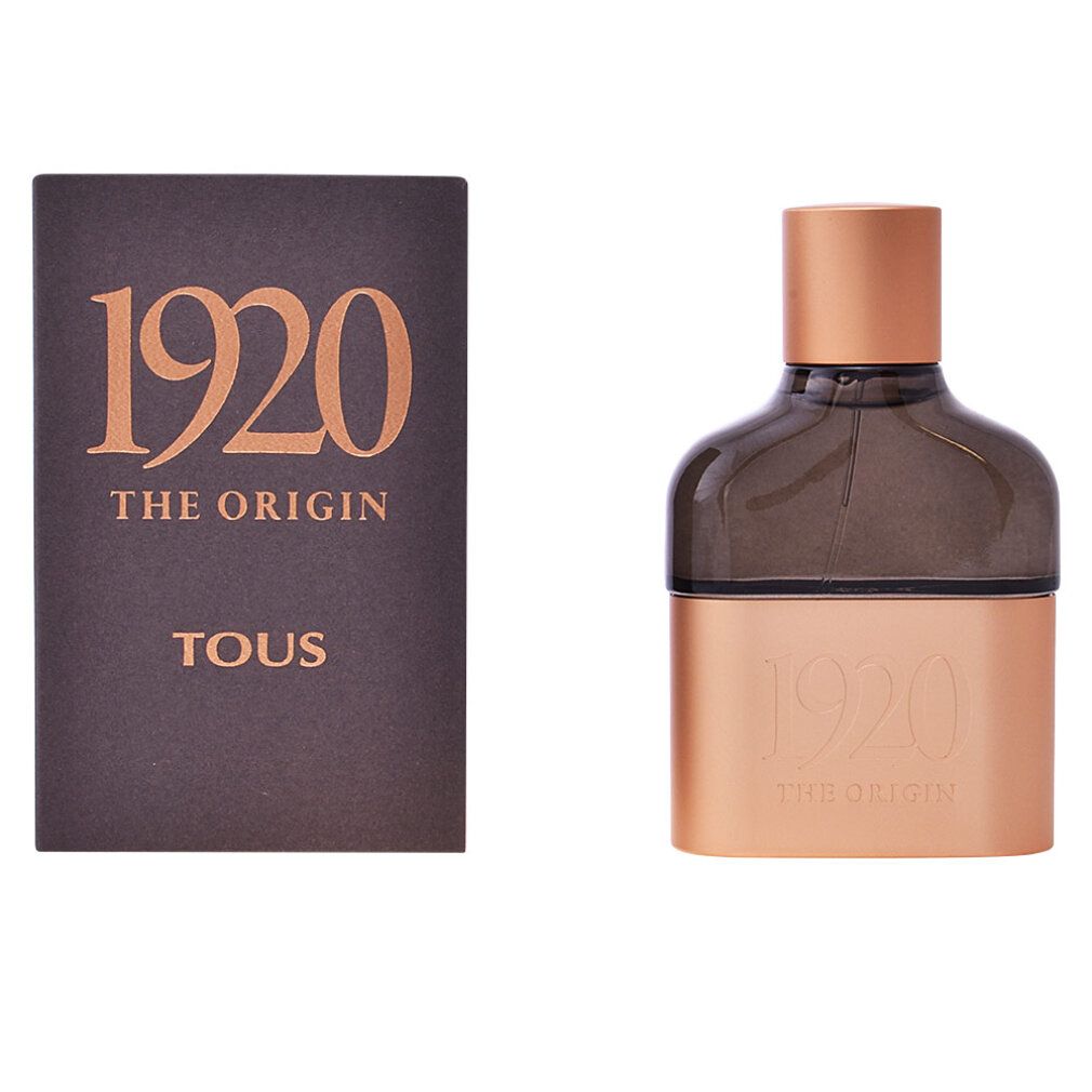 Flacon de parfum et emballage. Flacon avec base et bouchon cuivrés, verre foncé. Emballage avec texte doré.