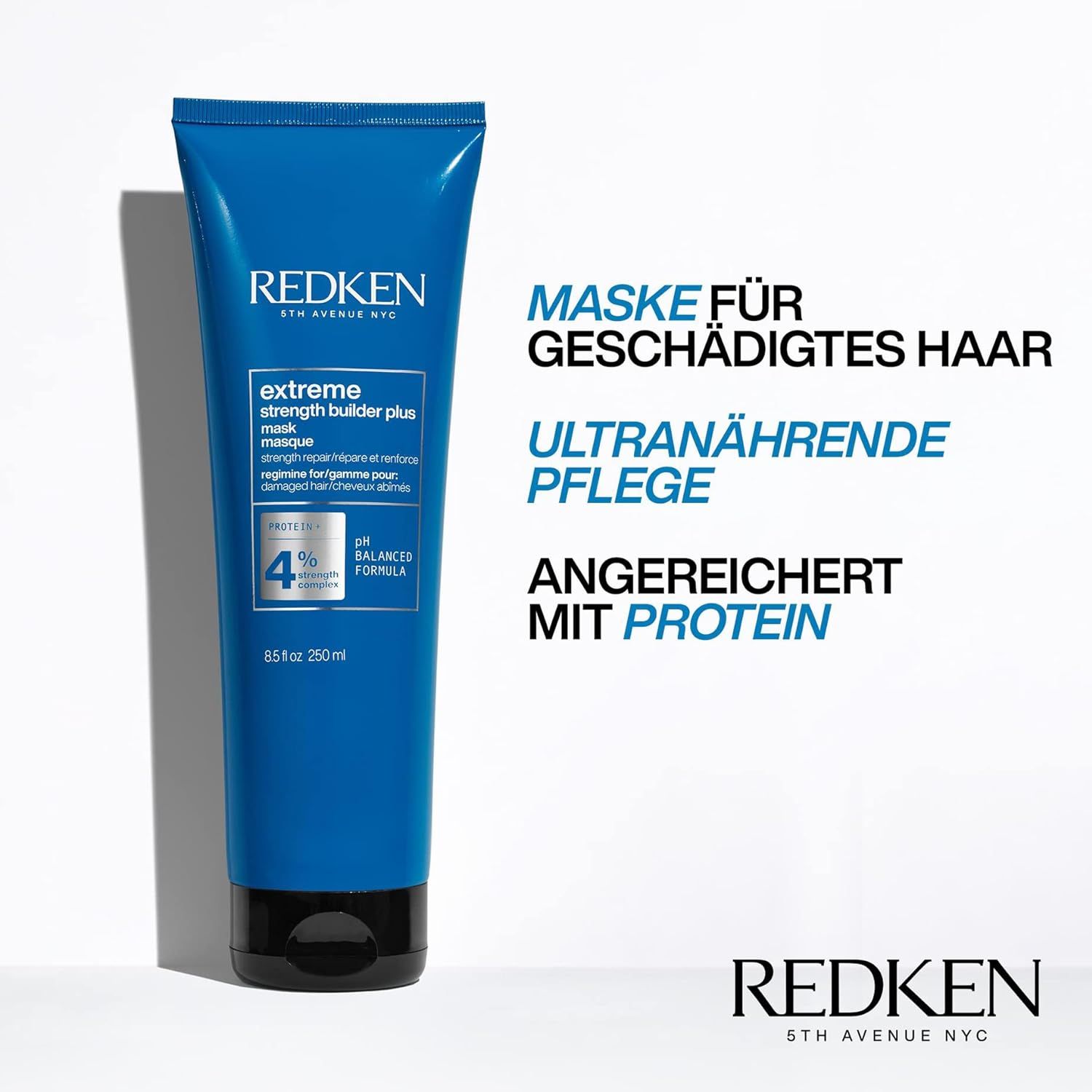 Blauwe tube met productnaam en tekst. Tekst in het Nederlands: Masker voor beschadigd haar, ultra-voedende verzorging, verrijkt met proteïne.