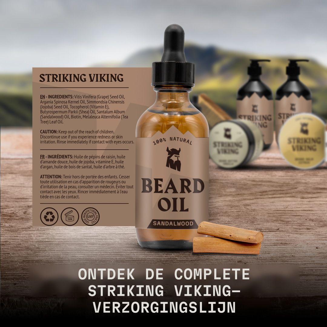 Striking Viking Baardolie Sandelhout in glazen fles met druppelaar, op houten tafel met producten en berglandschap.