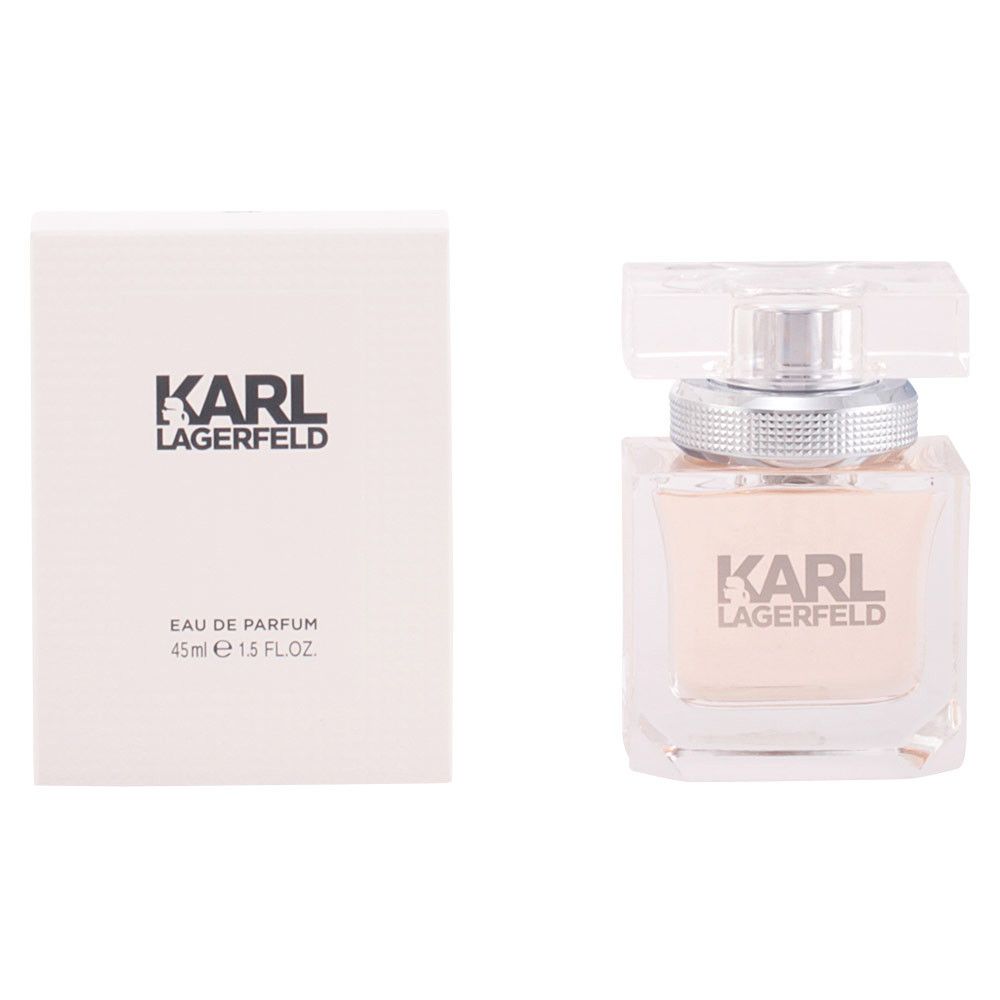Parfumfles en verpakking. Fles vierkant, transparant. Witte verpakking, opschrift: KARL LAGERFELD.