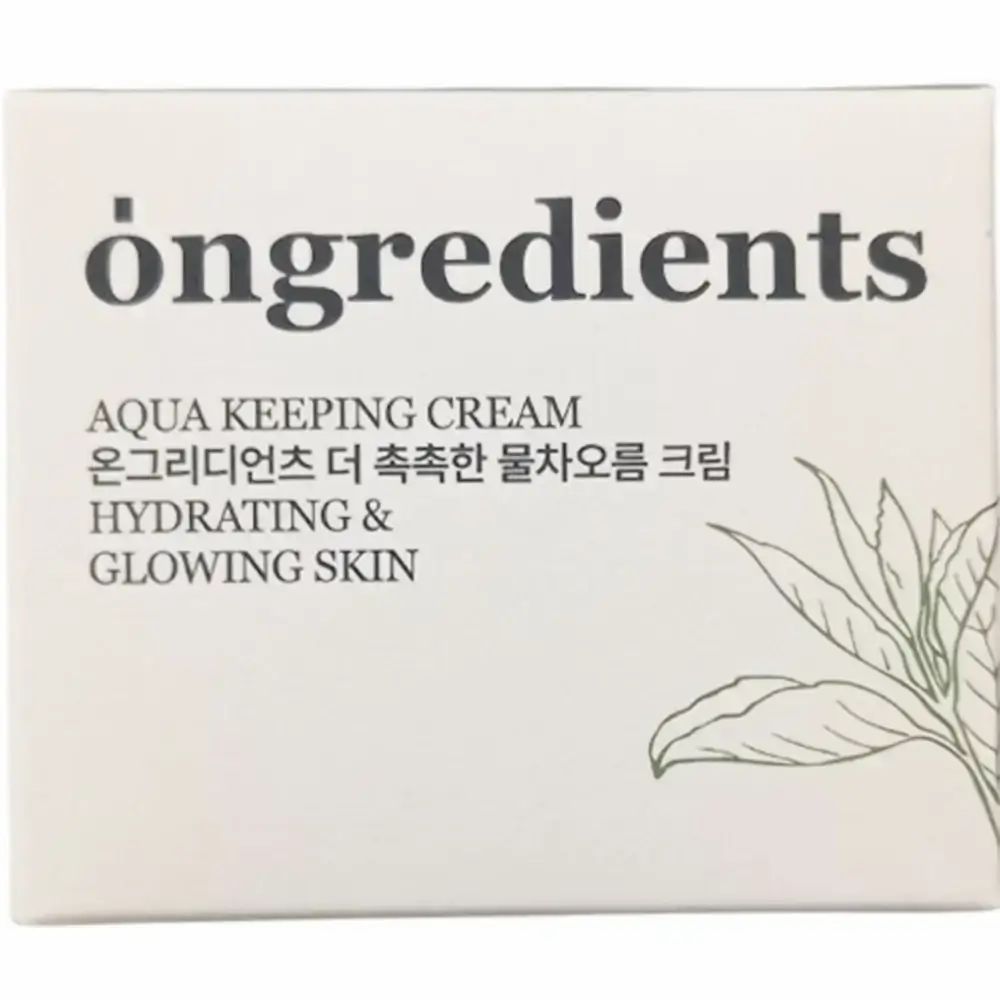 Emballage blanc du produit. Inscription : Ongredients, Aqua Keeping Cream, Hydrating & Glowing Skin. Avec des feuilles vertes.