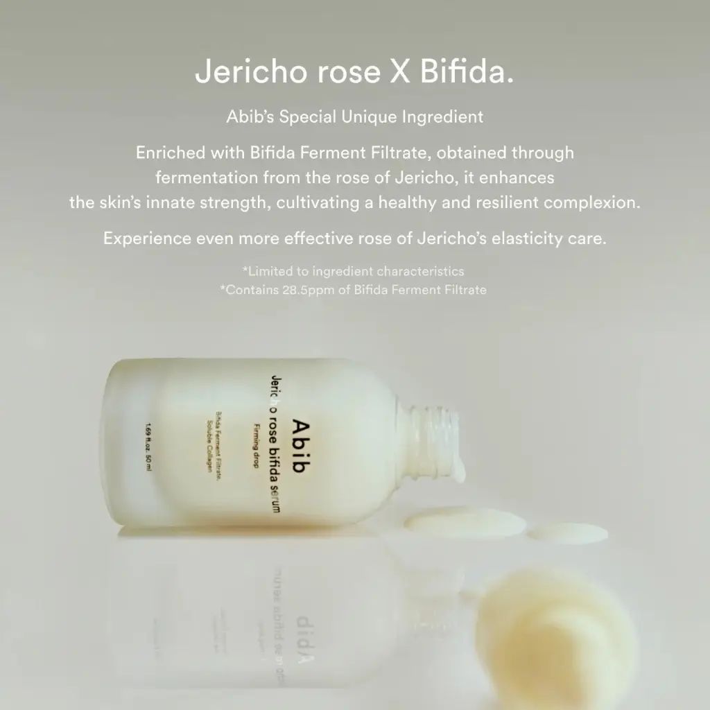 Serumfles ligt op een oppervlak. Opschrift: Abib Jericho Rose Bifida Serum Firming Drop. Tekst: Jericho rose X Bifida. Ingrediënten.