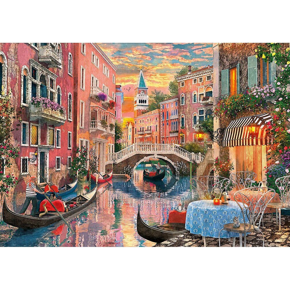 Puzzel met Venetië-afbeelding. Gondels, brug, gebouwen. Zonsonderganghemel. Clementoni-logo zichtbaar.