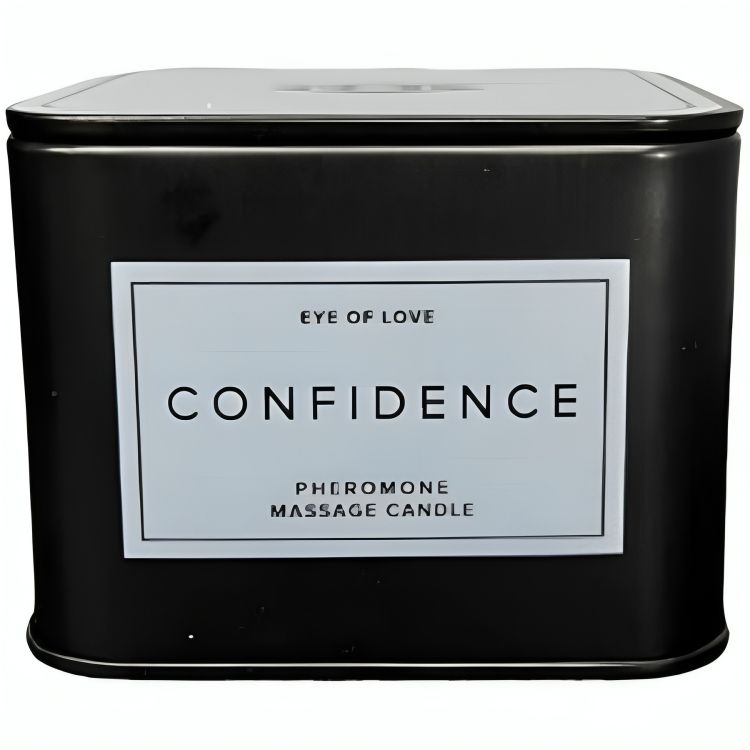 Zwarte kaars in zwarte metalen doos met deksel, opschrift "CONFIDENCE PHEROMONE MASSAGE CANDLE".