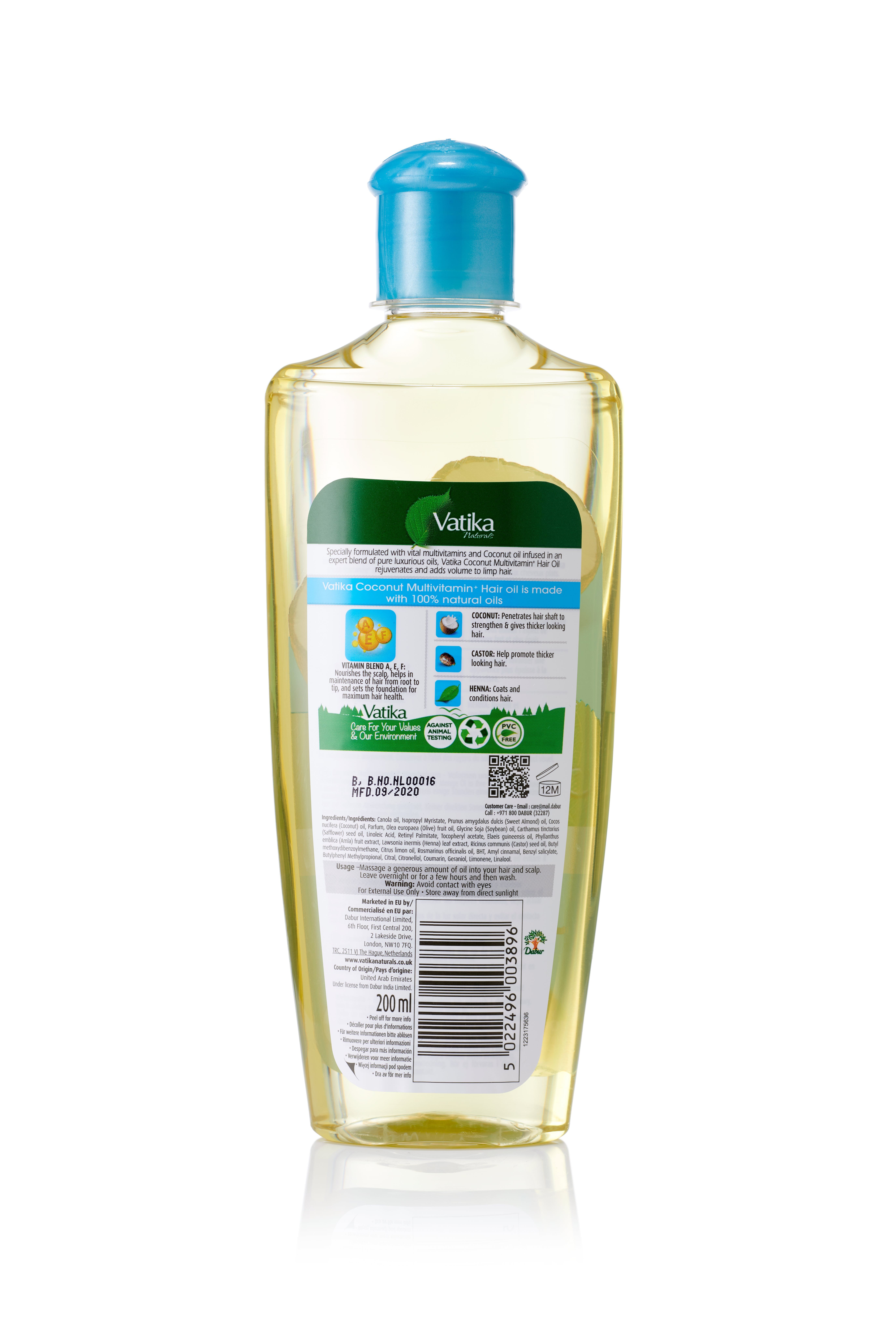 Achterkant van de Vatika Naturals haaroliefles. Opschriften en logo's. Bevat informatie over ingrediënten en fabrikant. 200 ml.