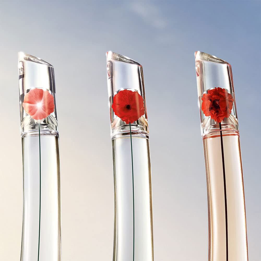 Flacon Kenzo Flower By Kenzo L'Absolue Eau de Parfum avec une fleur rouge dans le bouchon.