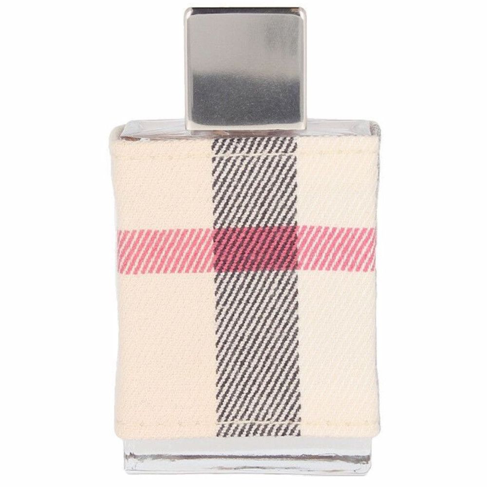 Flacon de parfum avec revêtement en tissu à carreaux. Rayures roses et noires.